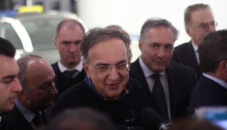 FCA CEO Sergio Marchionne discusses a Fiat Chrysler merger with reporters