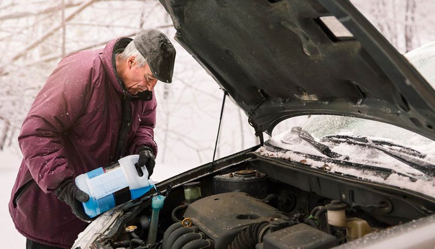 A man knows how to work on your car in the cold