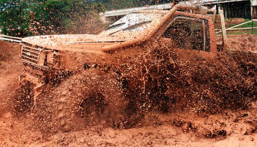 Mud Tires for Trucks (4) Sure mud tires for trucks look cool, but do you really need the big chunkies on your daily driver? We sling the information you need.